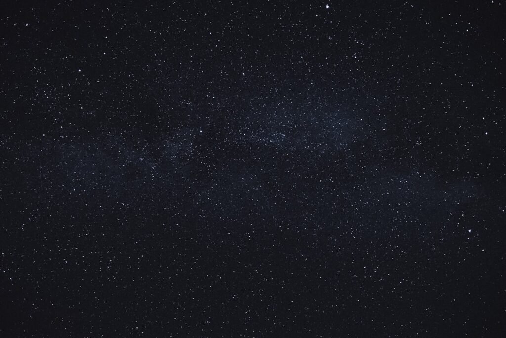 Artistic view of a black hole in space