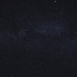 Artistic view of a black hole in space