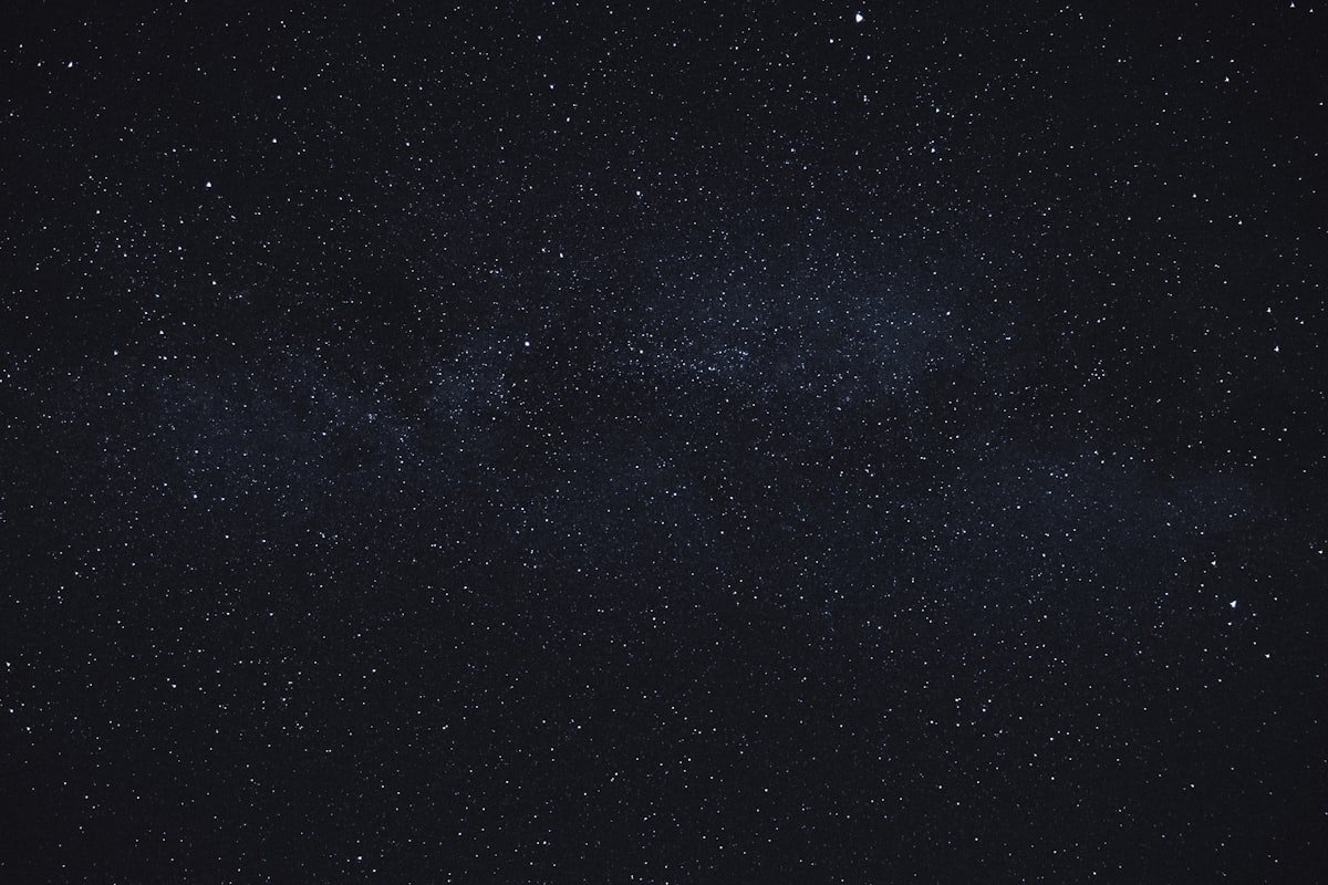 Artistic view of a black hole in space