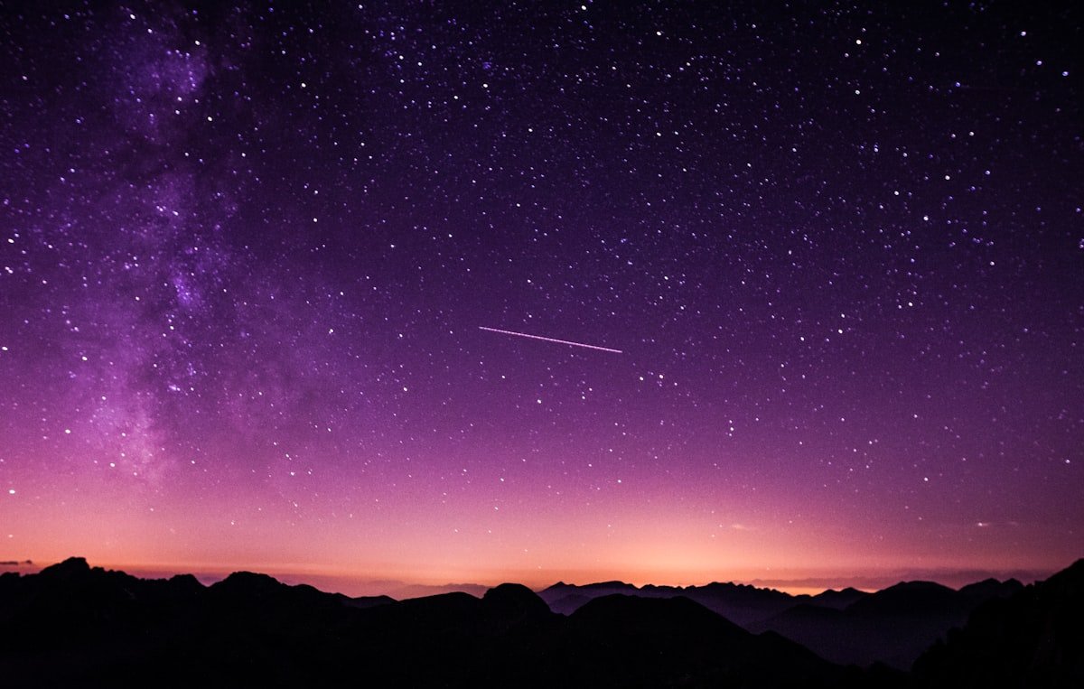 A person under a sky full of stars