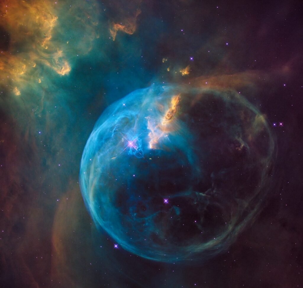 Bright star against a dark space background