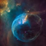 Bright star against a dark space background